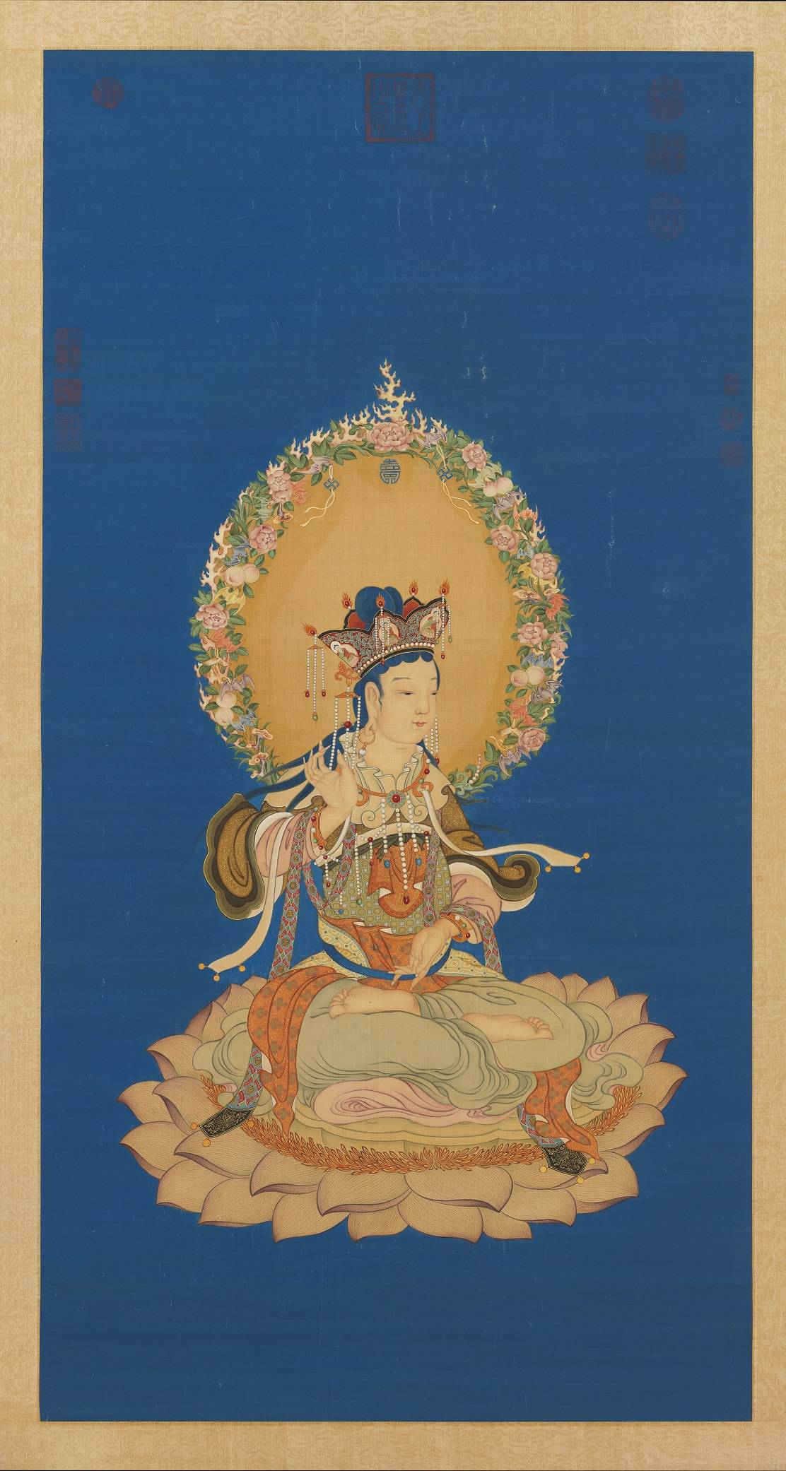 清丁觀鵬畫蓮座文殊像軸.絹.125.7x65.2cm.台北故宫博物院.故畫002773.大小2779x5204 - 副本